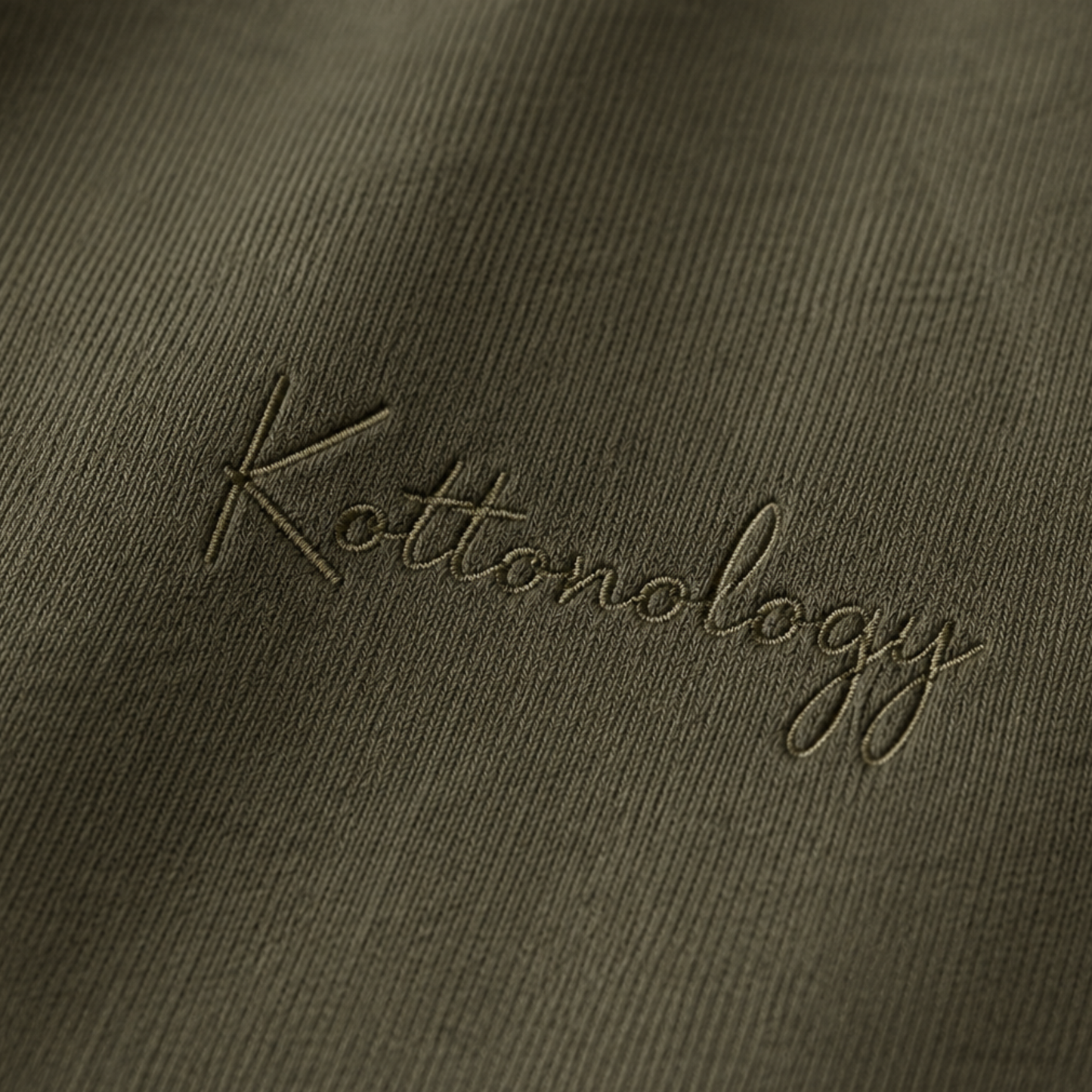 Hoodie in Khaki Green with Embroidered Print